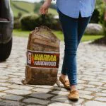 Hardwood logs in net bags